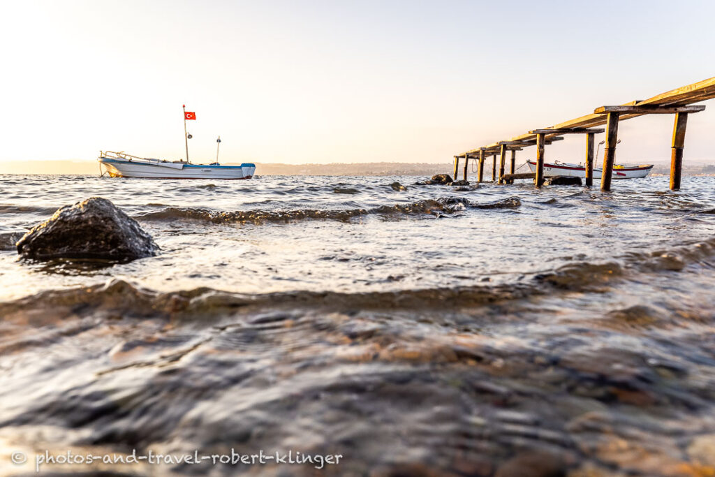 A fishing boat in the aegean sea of Turkey during sunrise