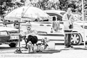 Two men on a market in Turkey, black and white photo