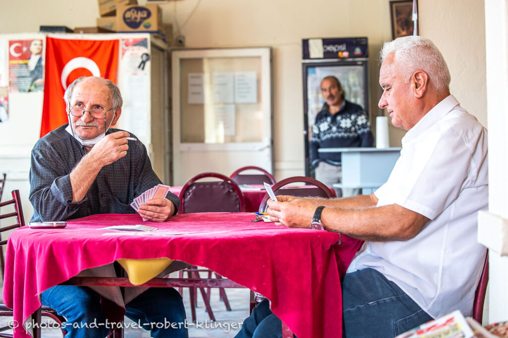 Two men playing cards in a tearoom in Turkey