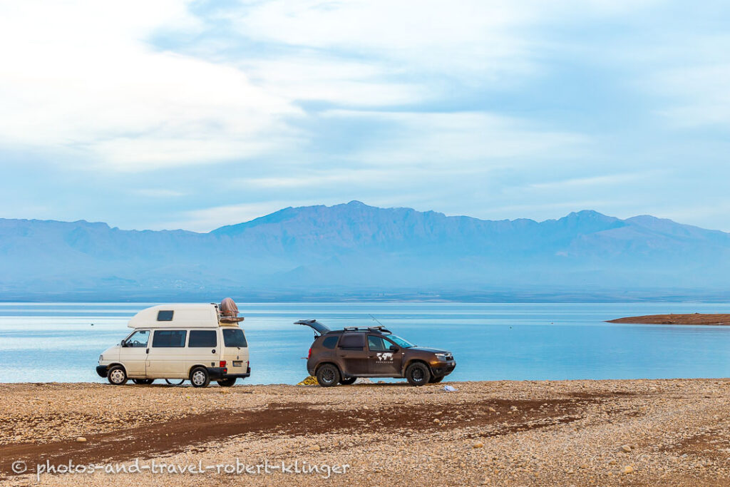 Two cars parking overnight in Iraq at Lake Dukan